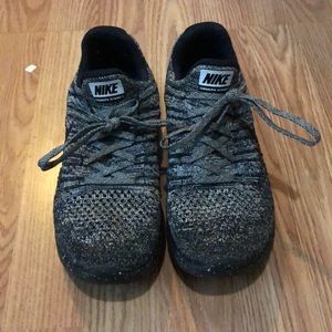 Grey and white Nike’s